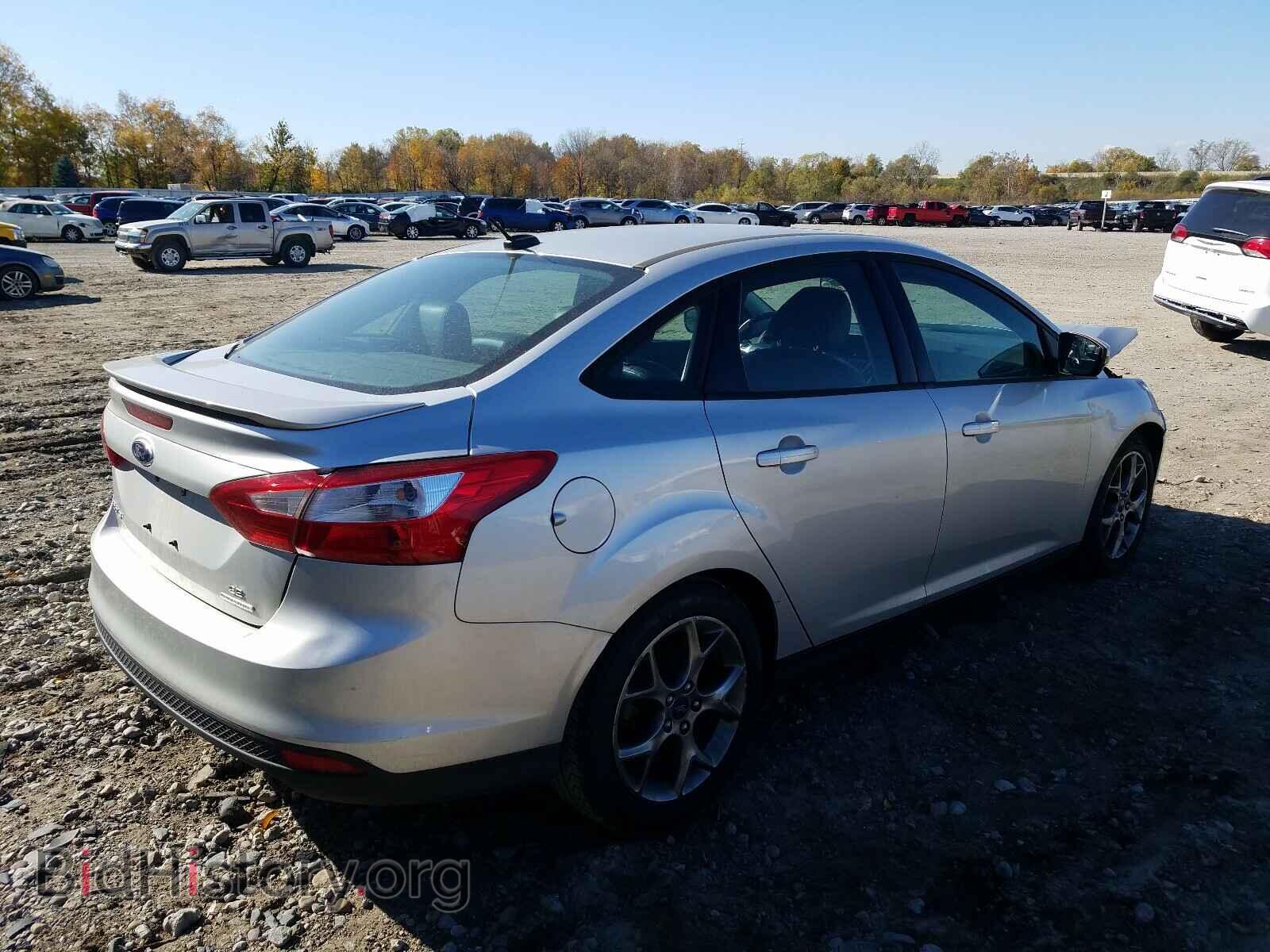 2013 FORD FOCUS - VIN: 1FADP3F20DL137568 - Photo 4