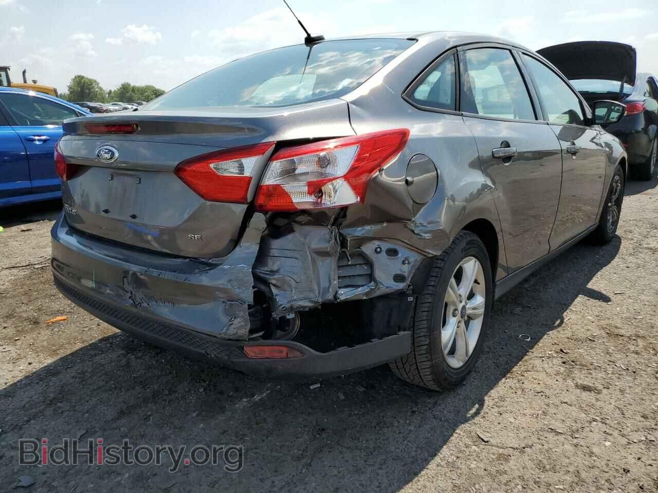 2014 FORD FOCUS - VIN: 1FADP3F27EL409406 - Photo 4
