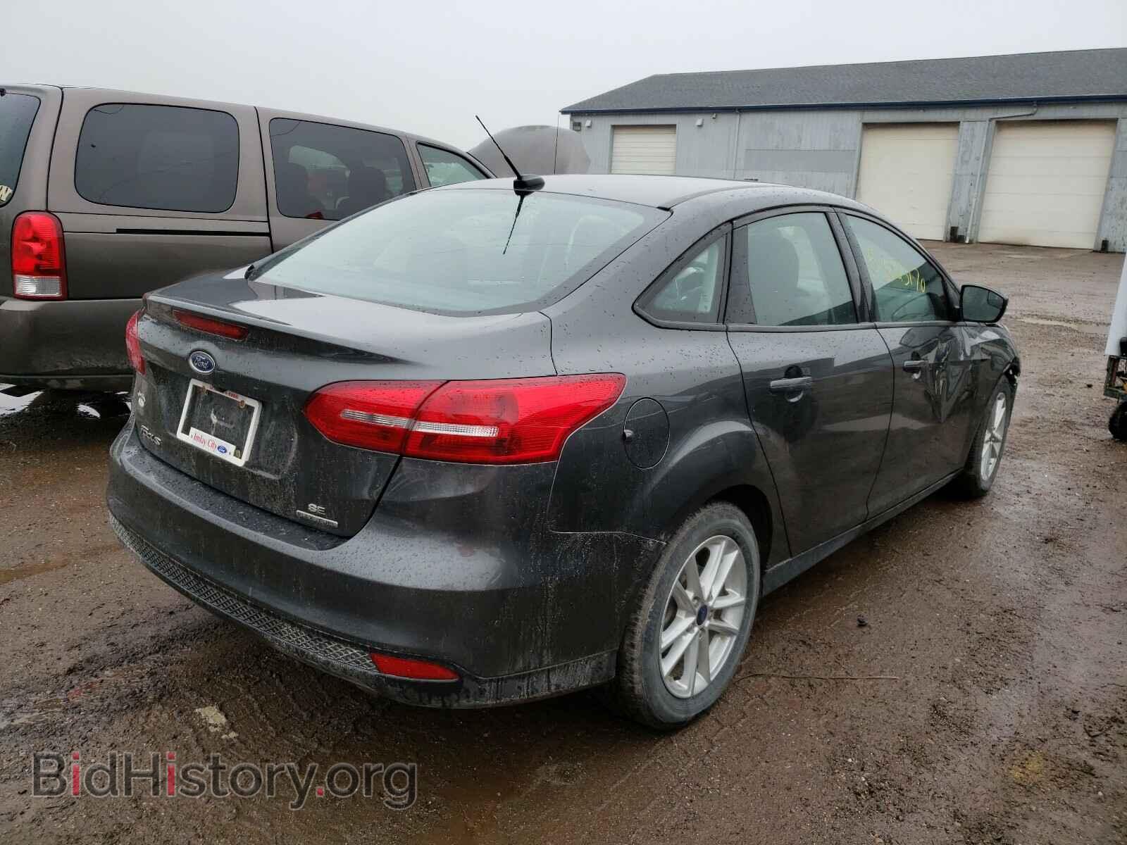 2016 FORD FOCUS - VIN: 1FADP3F23GL404318 - Photo 4