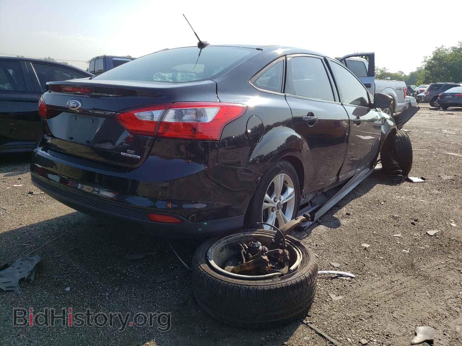 2014 FORD FOCUS - VIN: 1FADP3F21EL275024 - Photo 4