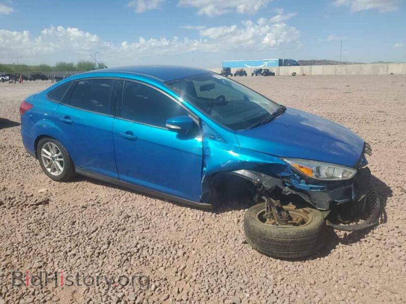 2016 Ford FOCUS (VIN 1FADP3F22GL369822) — photo 4 of 15