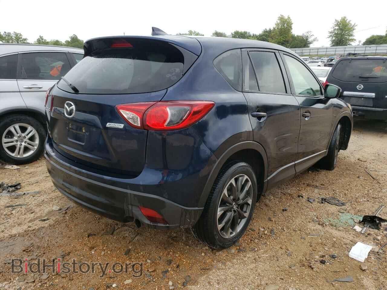 2016 MAZDA CX-5 - VIN: JM3KE2DY9G0705600 - Фото 4