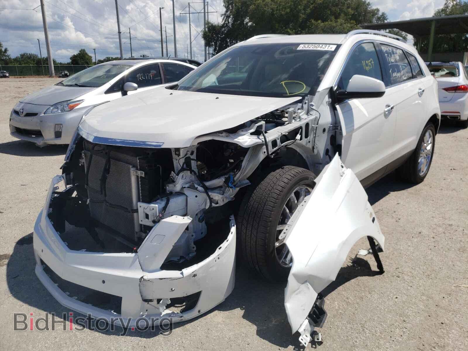 2014 CADILLAC SRX - VIN: 3GYFNDE37ES520213 - Фото 2
