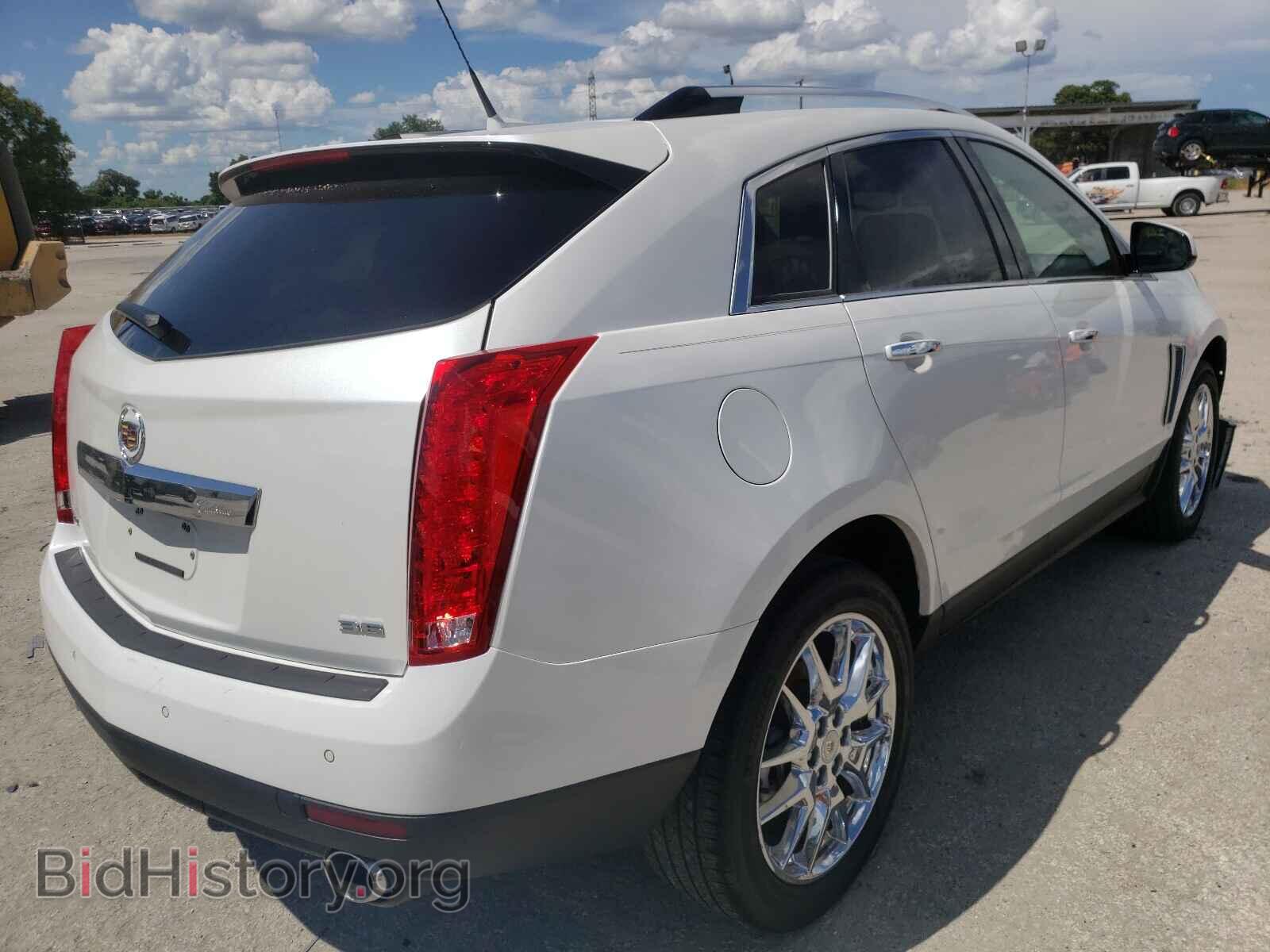 2014 CADILLAC SRX - VIN: 3GYFNDE37ES520213 - Фото 4