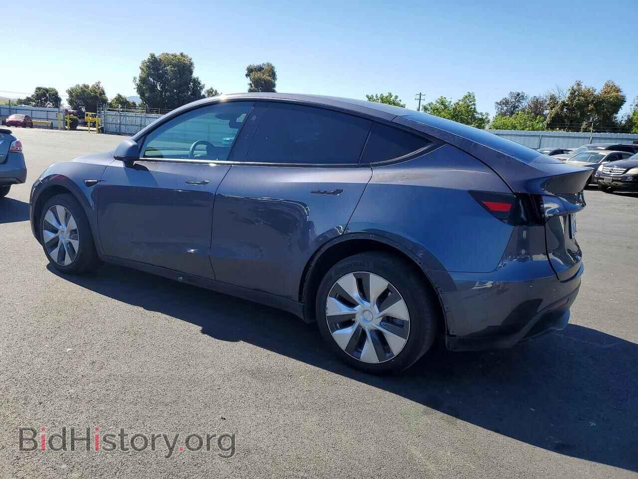 2023 TESLA MODEL Y - VIN: 7SAYGDEEXPF790710 - Фото 2