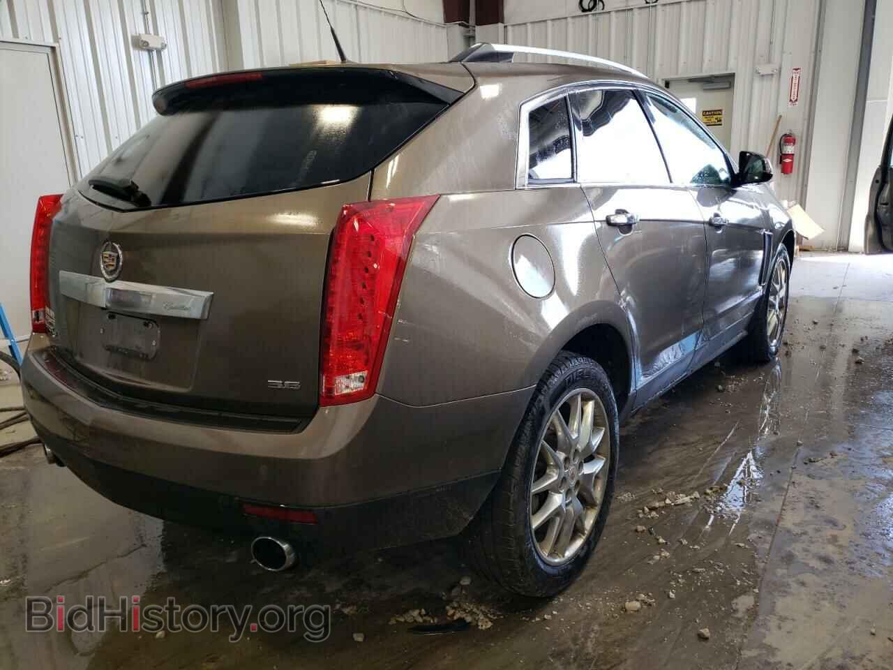 2014 CADILLAC SRX - VIN: 3GYFNFE39ES615433 - Фото 4