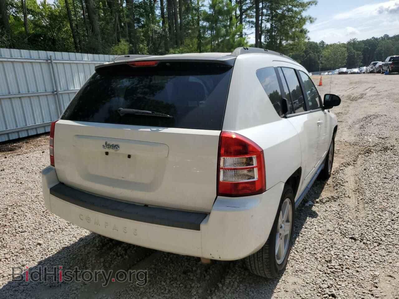 2010 JEEP COMPASS - VIN: 1J4NT4FB1AD611897 - Photo 4