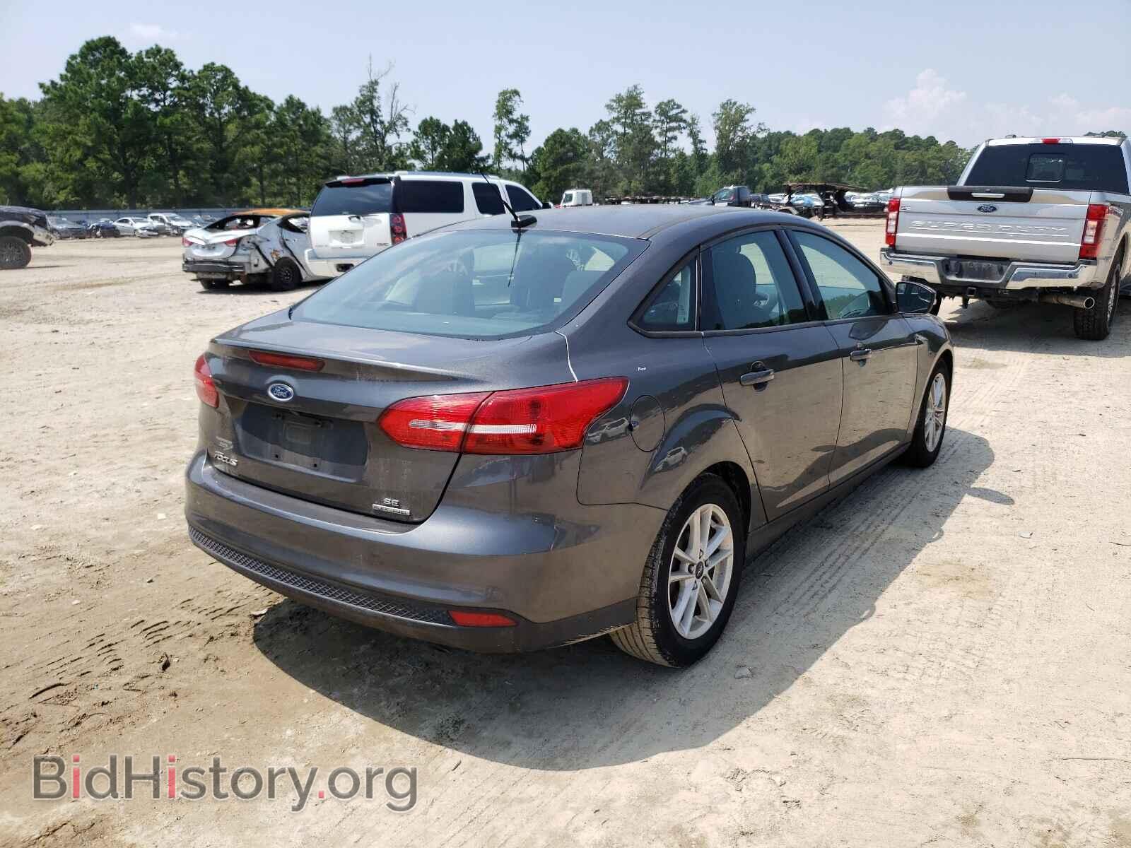 2015 FORD FOCUS - VIN: 1FADP3F21FL215505 - Photo 4