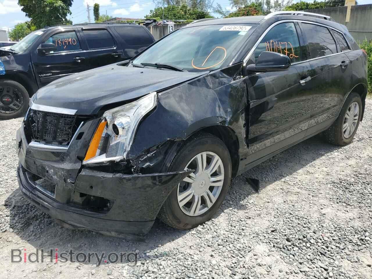 2014 CADILLAC SRX - VIN: 3GYFNCE36ES675426 - Фото 2