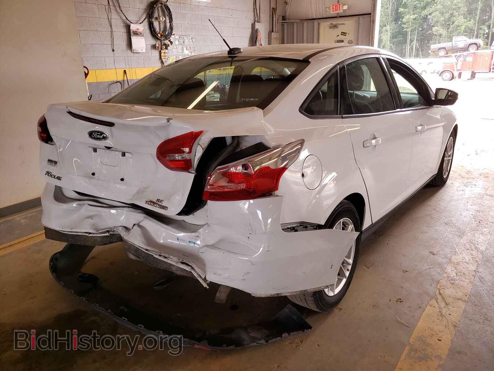 2016 FORD FOCUS - VIN: 1FADP3F2XGL216850 - Фото 9