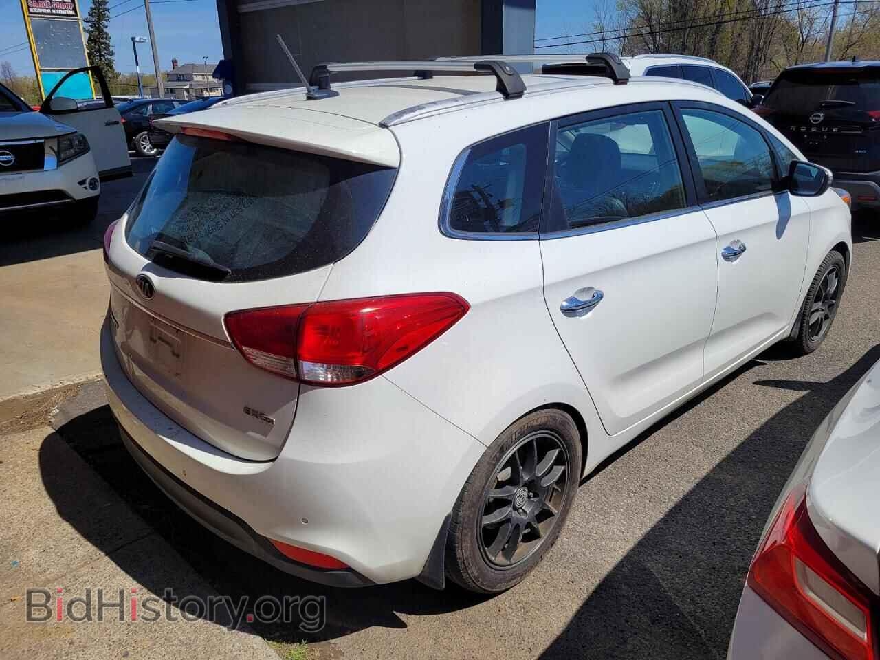 2014 KIA RONDO - VIN: KNAHU8A32E7010880 - Фото 4