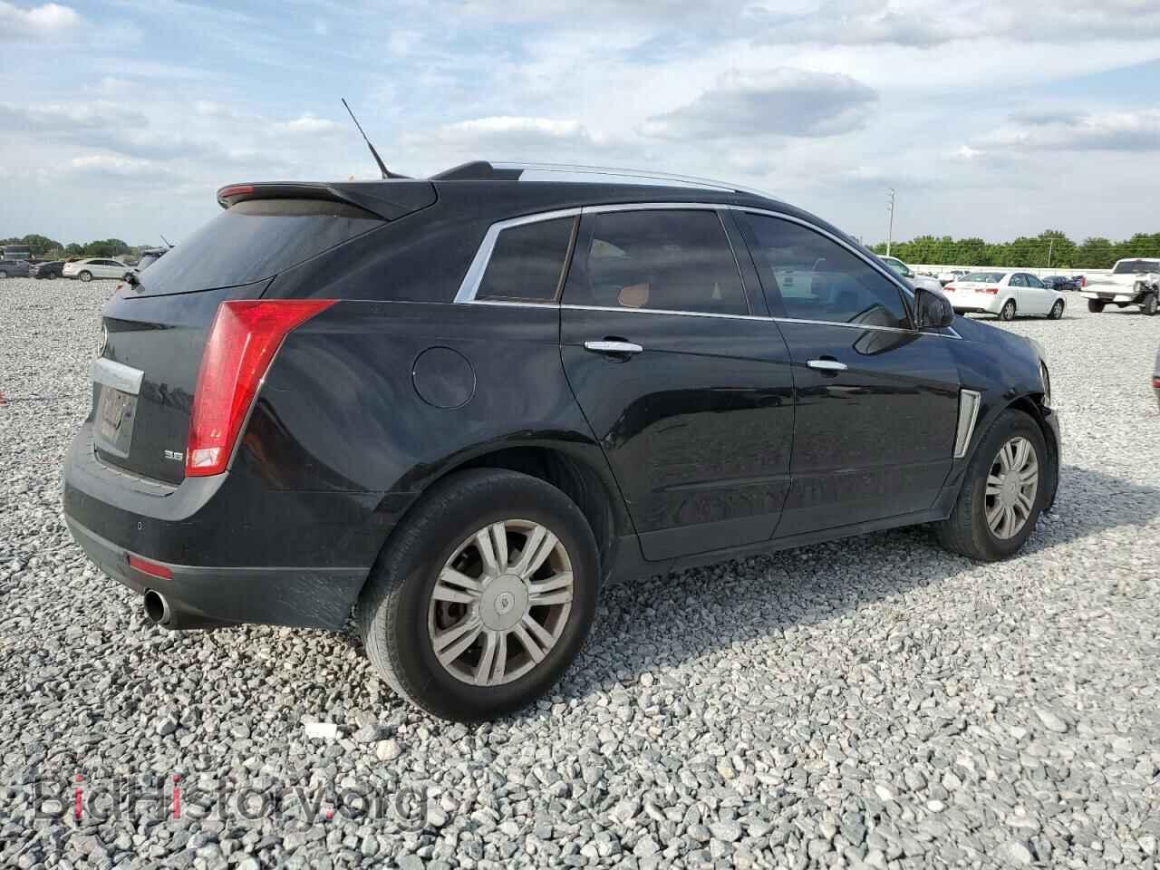 2013 CADILLAC SRX - VIN: 3GYFNCE31DS520751 - Фото 3