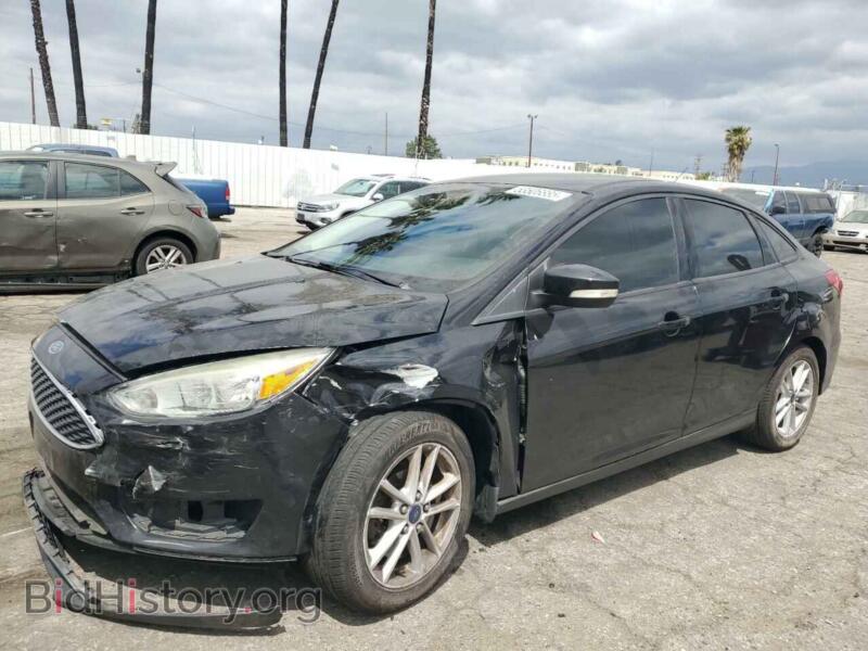2015 Ford FOCUS SE (VIN 1FADP3F20FL249872) — photo 1 of 12, Copart, damage: front end