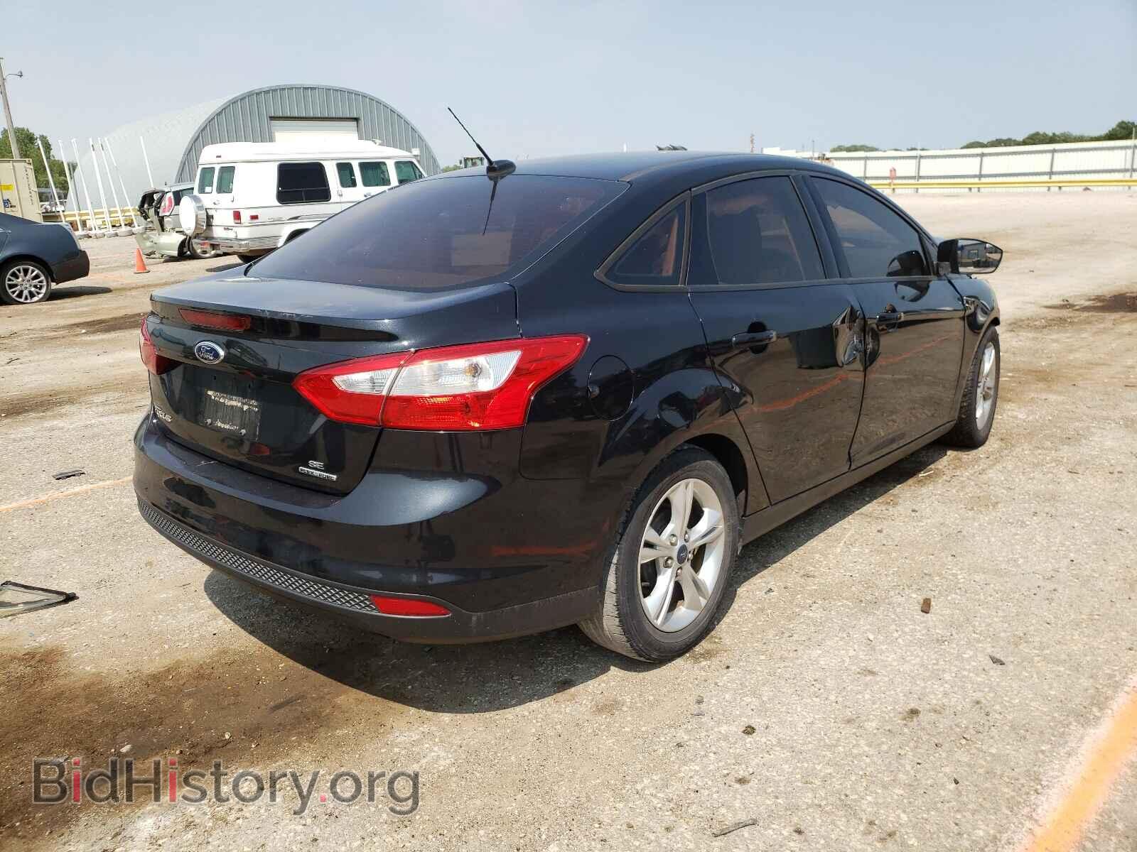 2014 FORD FOCUS - VIN: 1FADP3F2XEL245228 - Photo 4