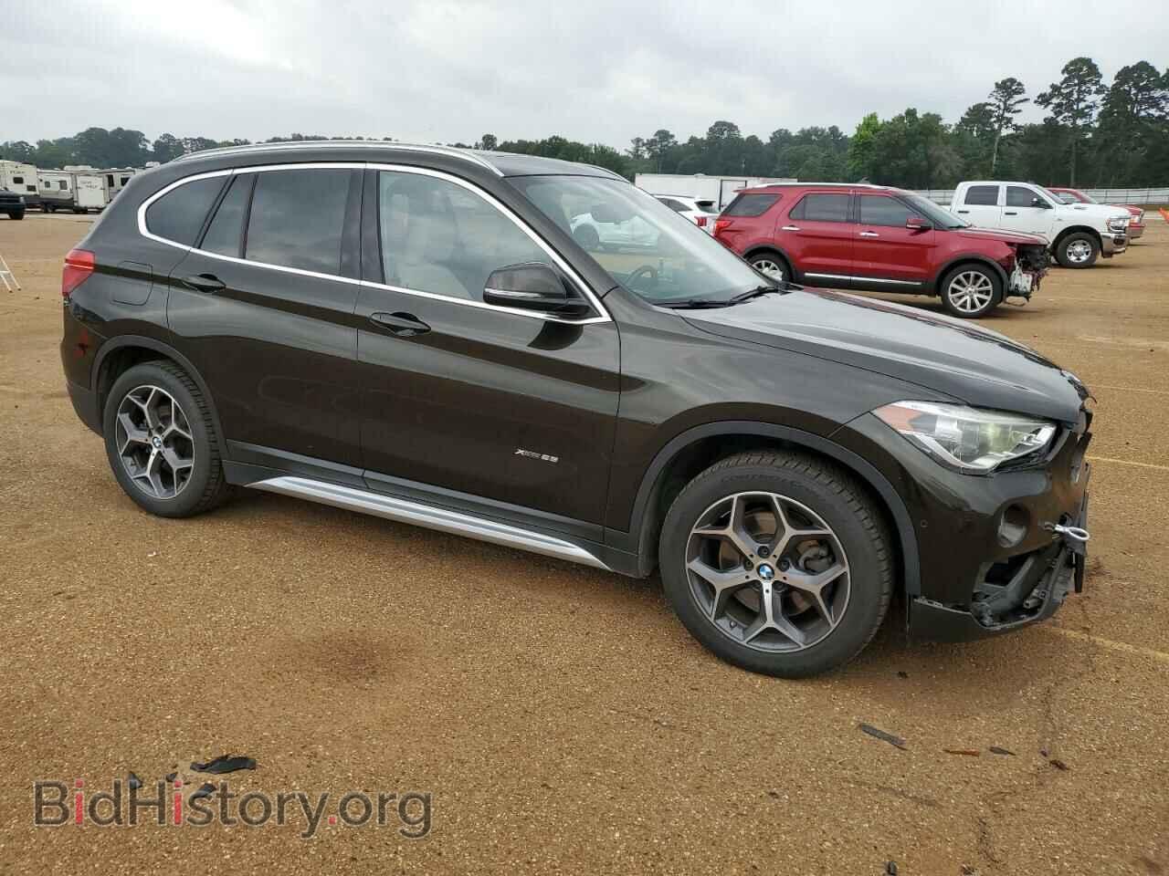 2017 BMW X1 - VIN: WBXHT3C38H5F80314 - Фото 4