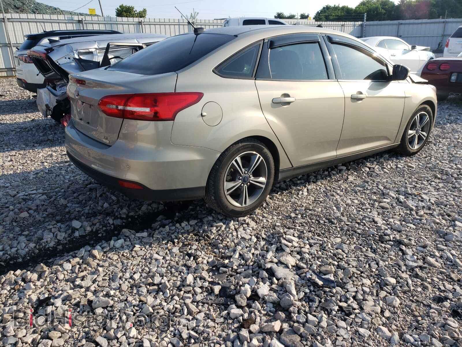 2016 FORD FOCUS - VIN: 1FADP3FE2GL244121 - Photo 4