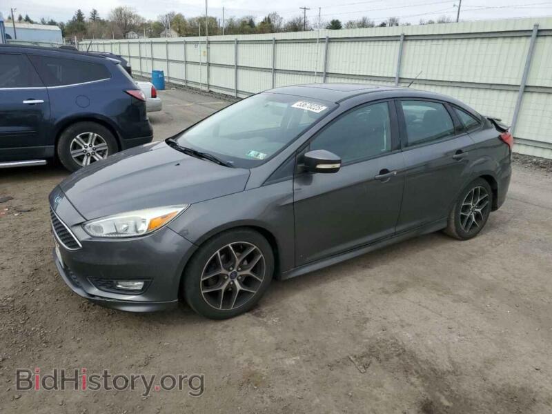 2015 Ford FOCUS SE (VIN 1FADP3F20FL267322) — фото 1 из 14, Copart, повреждение: задняя часть