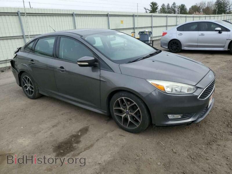 2015 Ford FOCUS (VIN 1FADP3F20FL267322) — фото 4 из 14
