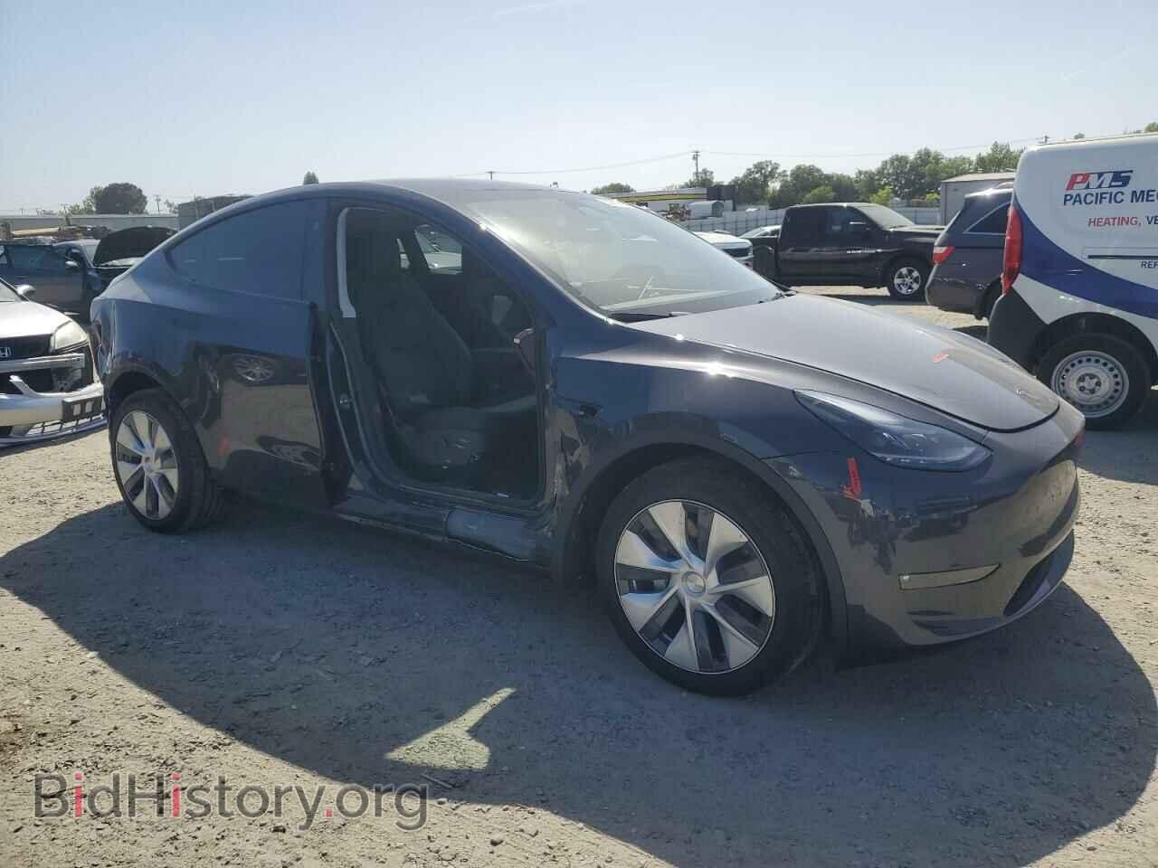 2024 TESLA MODEL Y - VIN: 7SAYGDEE0RF075700 - Photo 4