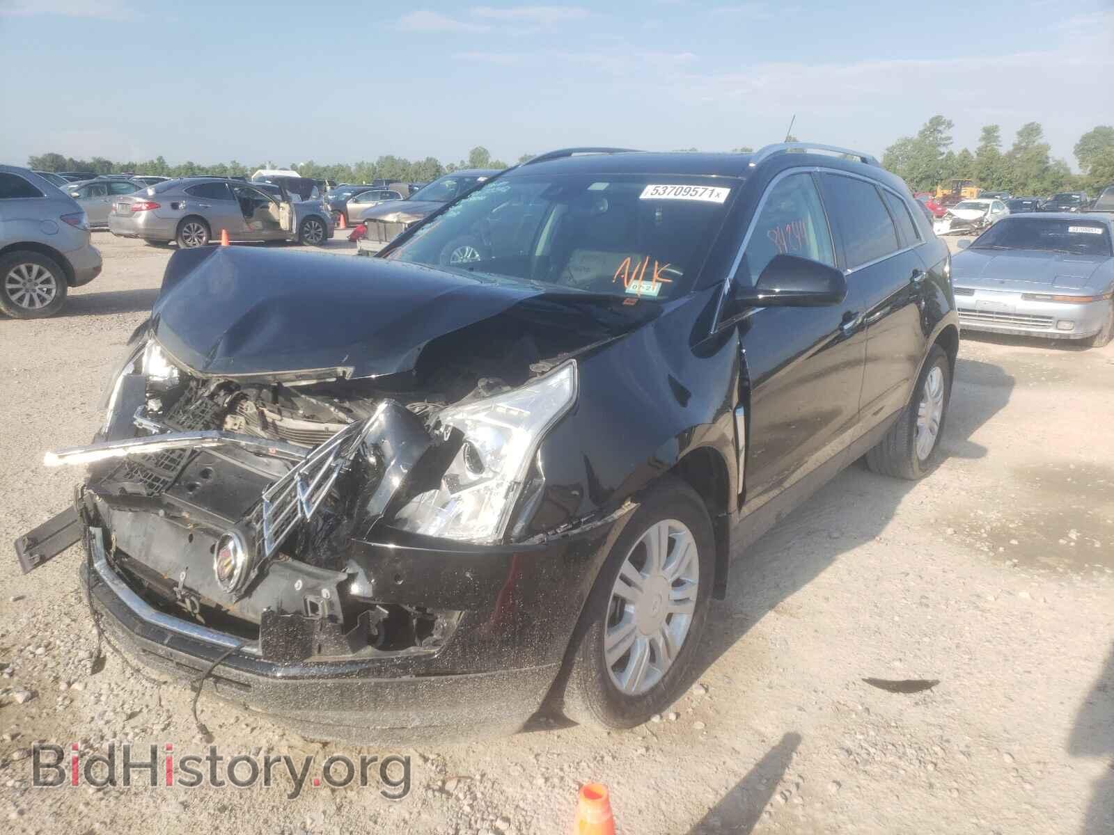 2013 CADILLAC SRX - VIN: 3GYFNCE30DS580102 - Фото 2