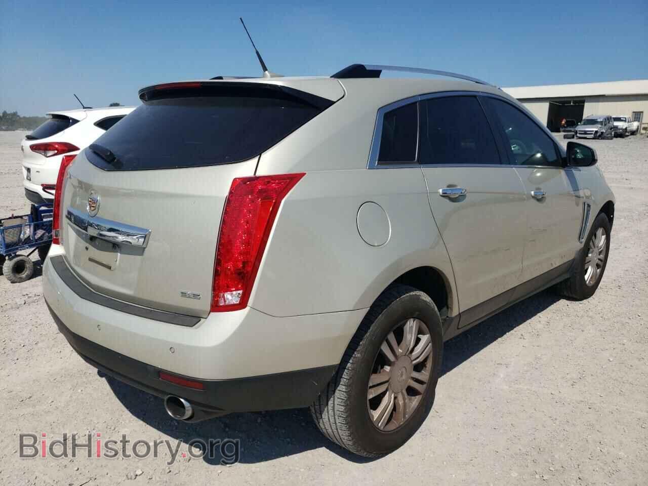 2014 CADILLAC SRX - VIN: 3GYFNBE33ES682392 - Фото 4