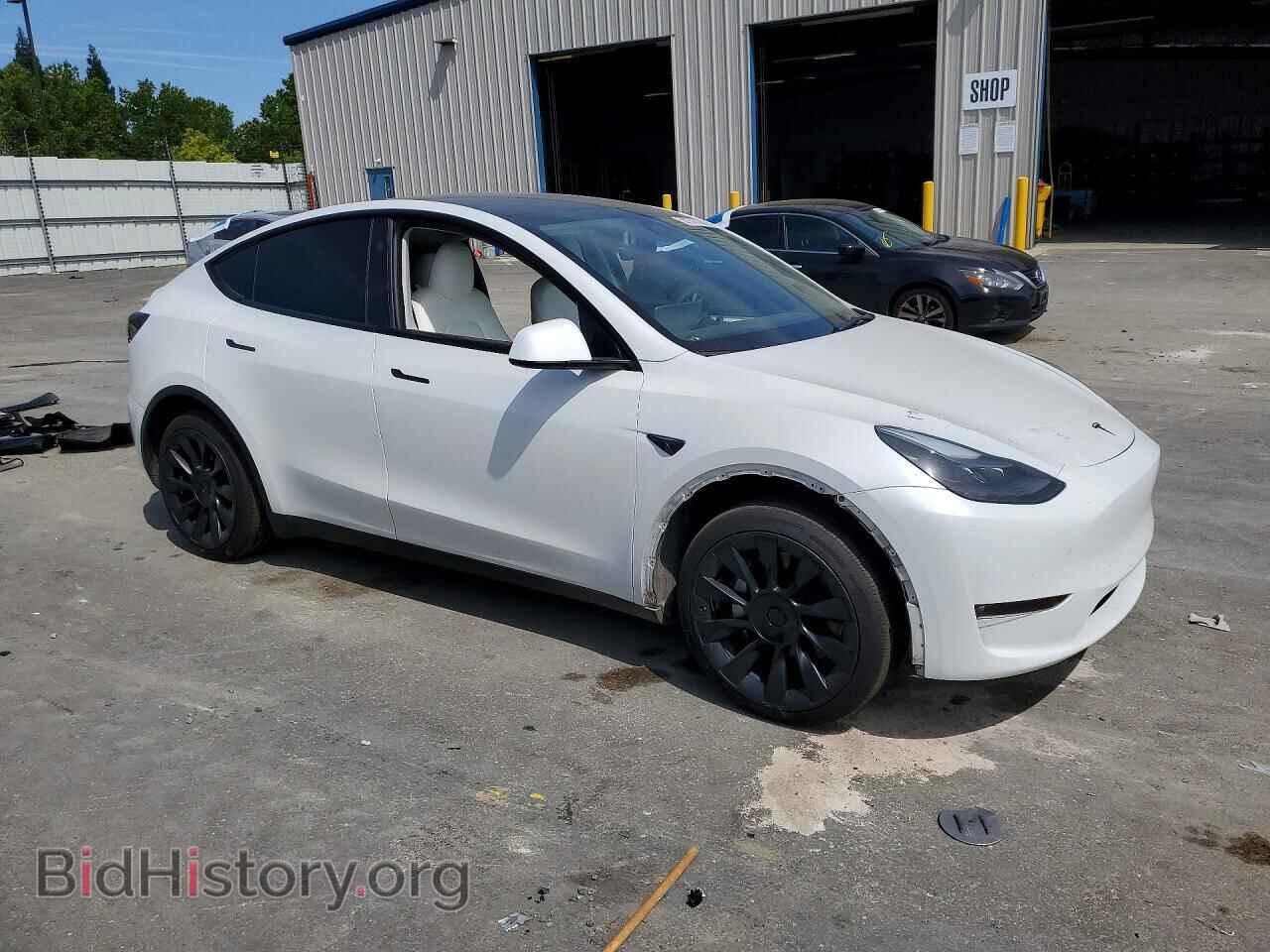 2023 TESLA MODEL Y - VIN: 7SAYGDEE8PF909564 - Photo 4