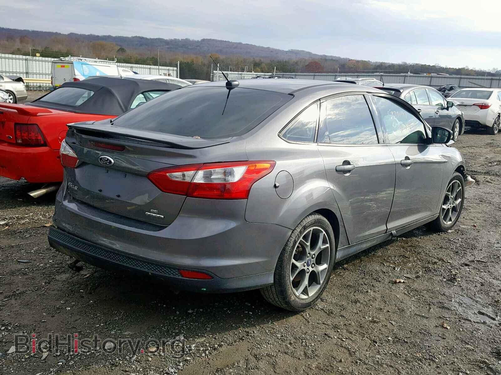 2014 FORD FOCUS - VIN: 1FADP3F24EL104834 - Photo 4