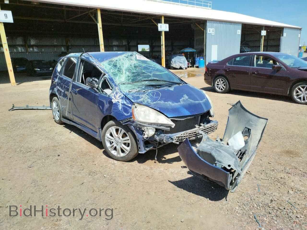 Фотография JHMGE8H5XBC010422 - HONDA FIT 2011