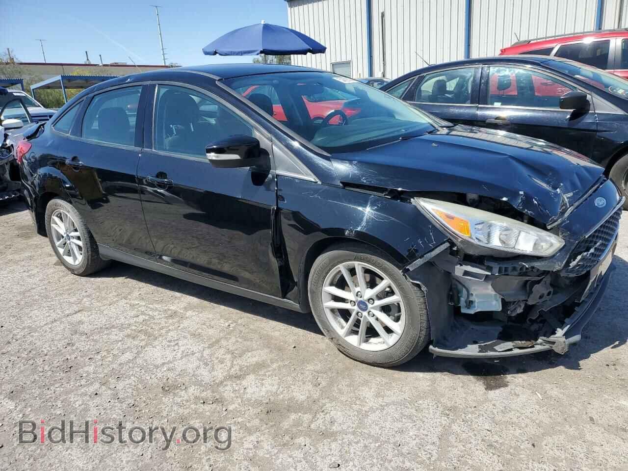 2017 FORD FOCUS - VIN: 1FADP3F29HL231597 - Photo 4