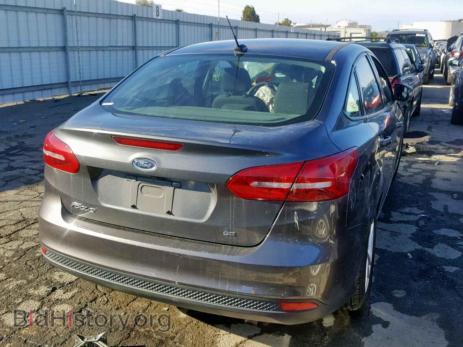 2016 FORD FOCUS SE - VIN: 1FADP3F2XGL352010 - Фото 4