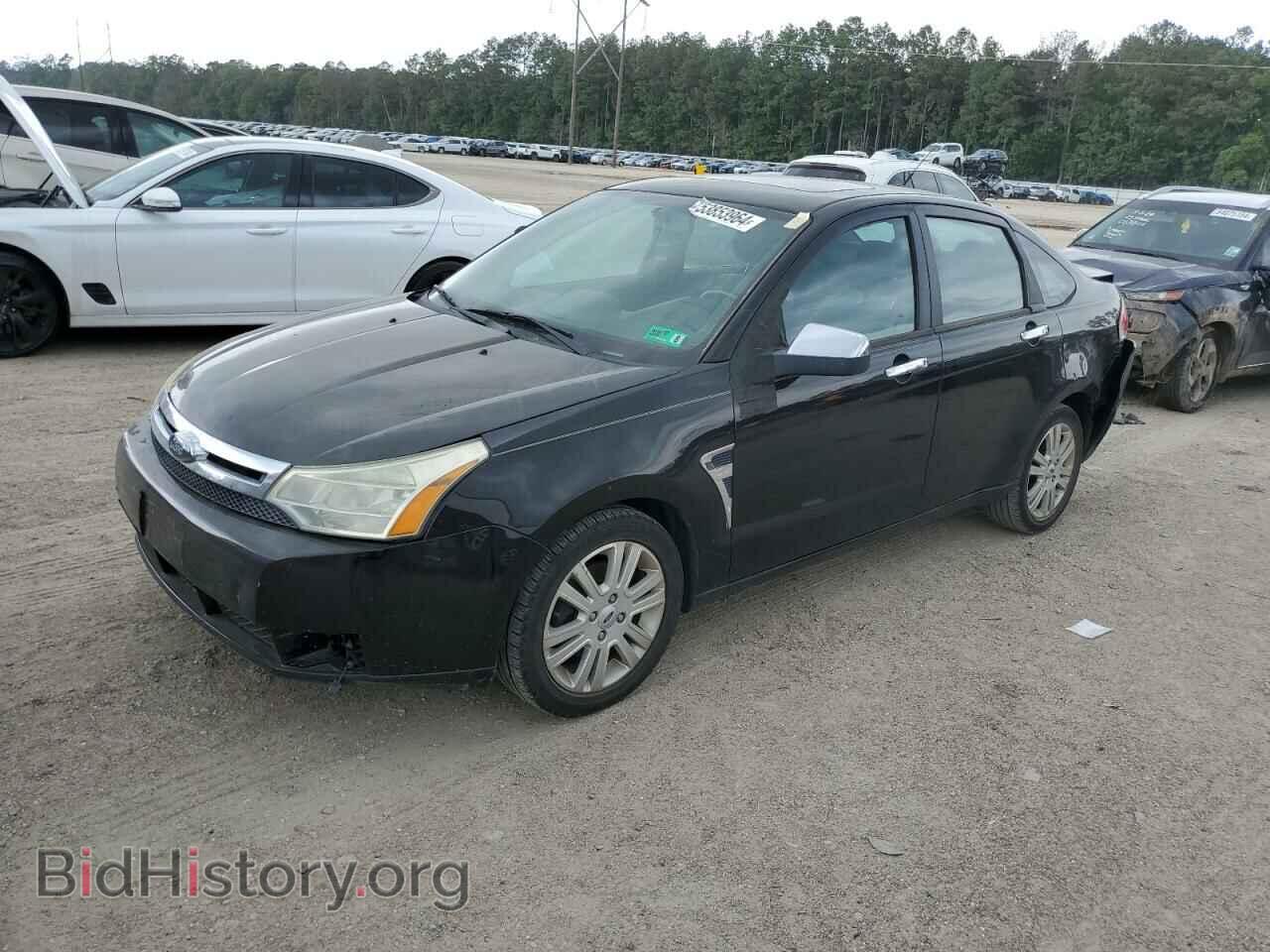 Фотография 1FAHP37N29W158700 - FORD FOCUS 2009