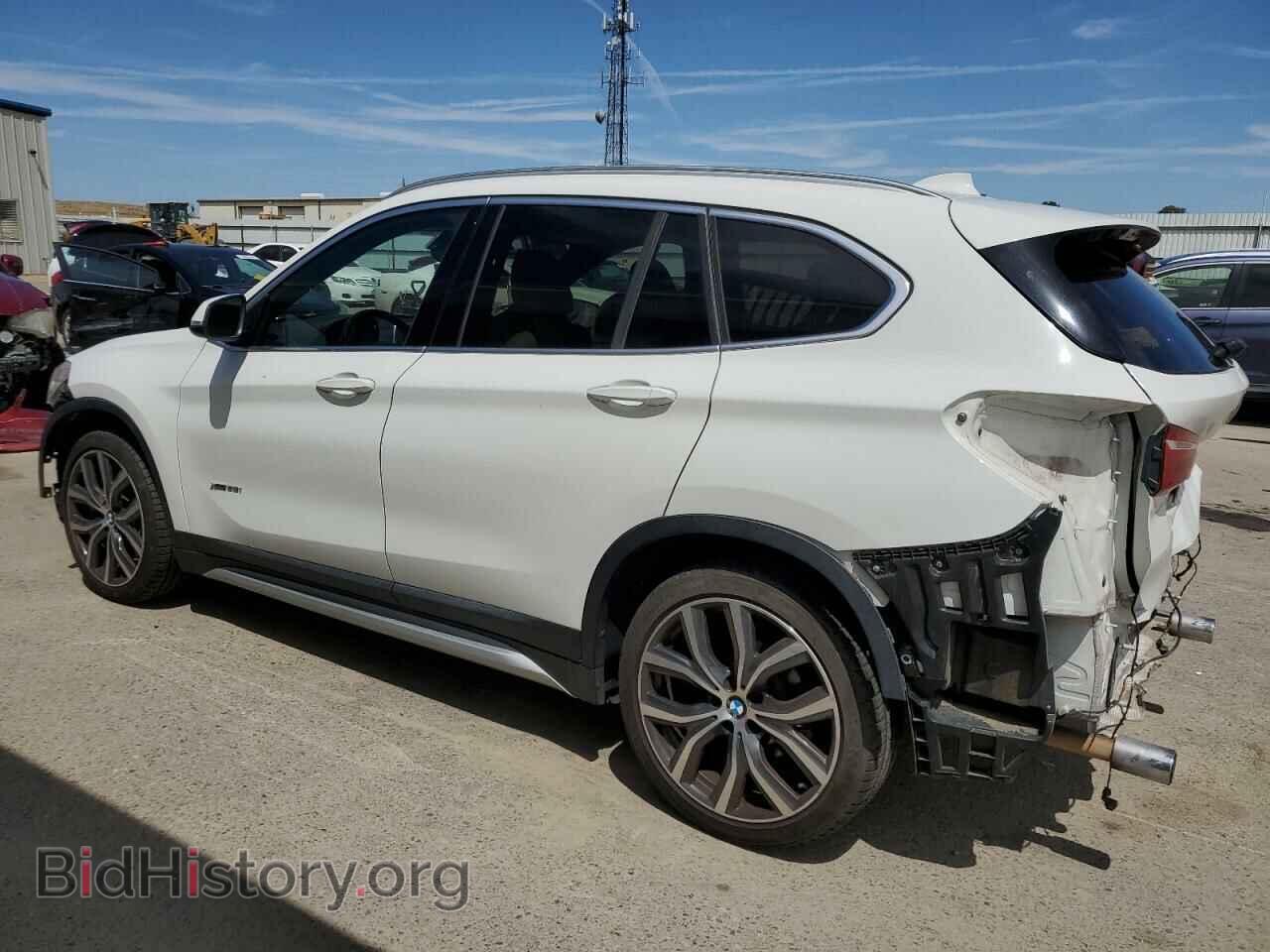 2017 BMW X1 - VIN: WBXHT3C32H5F86108 - Фото 2