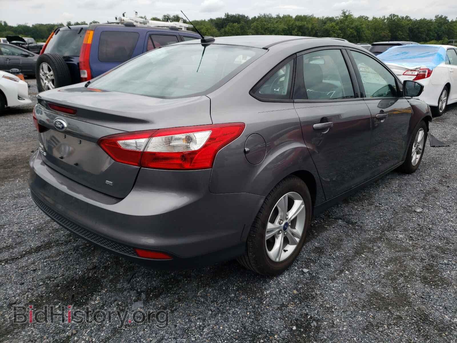 2014 FORD FOCUS - VIN: 1FADP3F22EL121874 - Photo 4