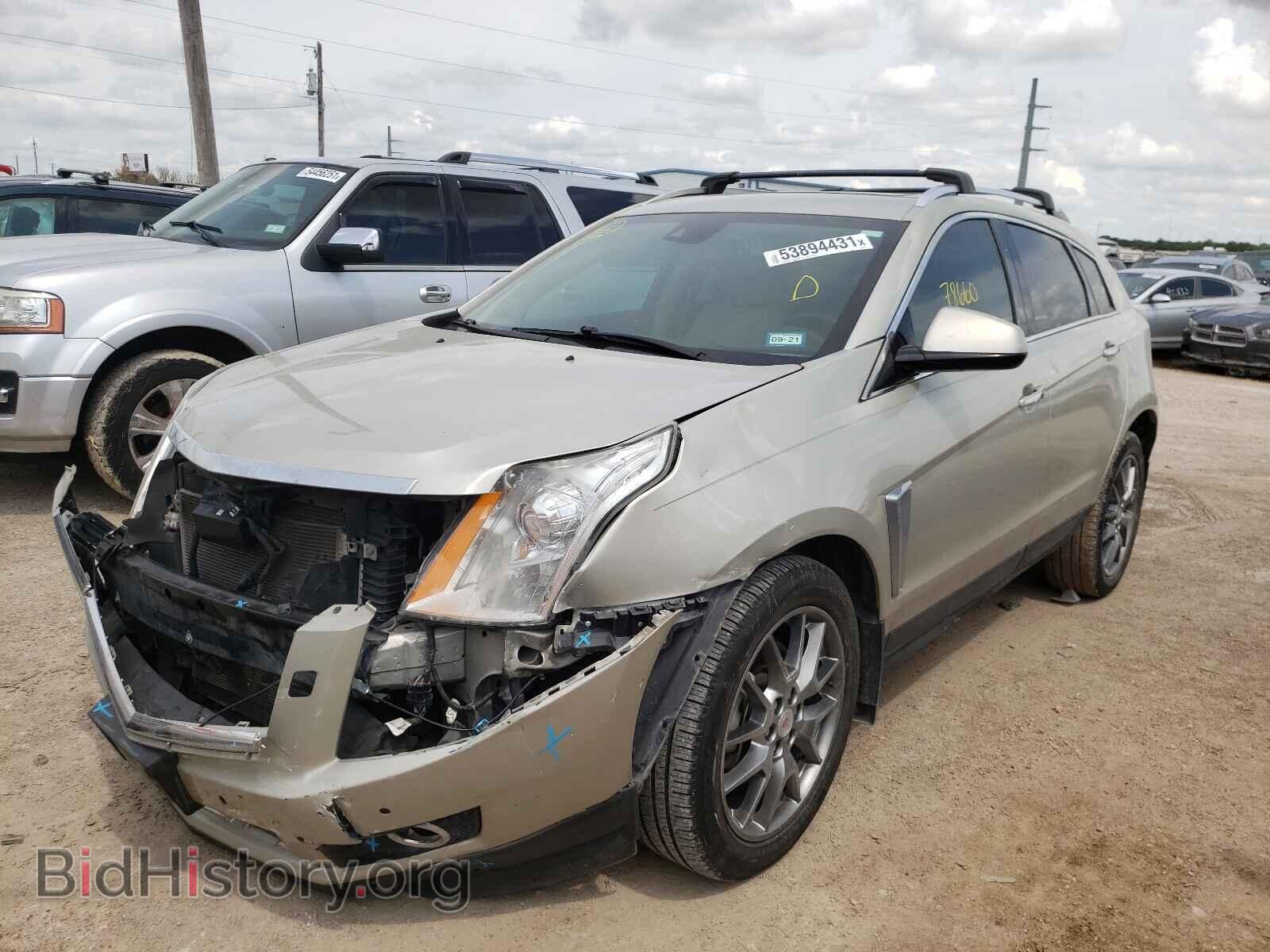 2014 CADILLAC SRX - VIN: 3GYFNDE38ES652168 - Фото 2