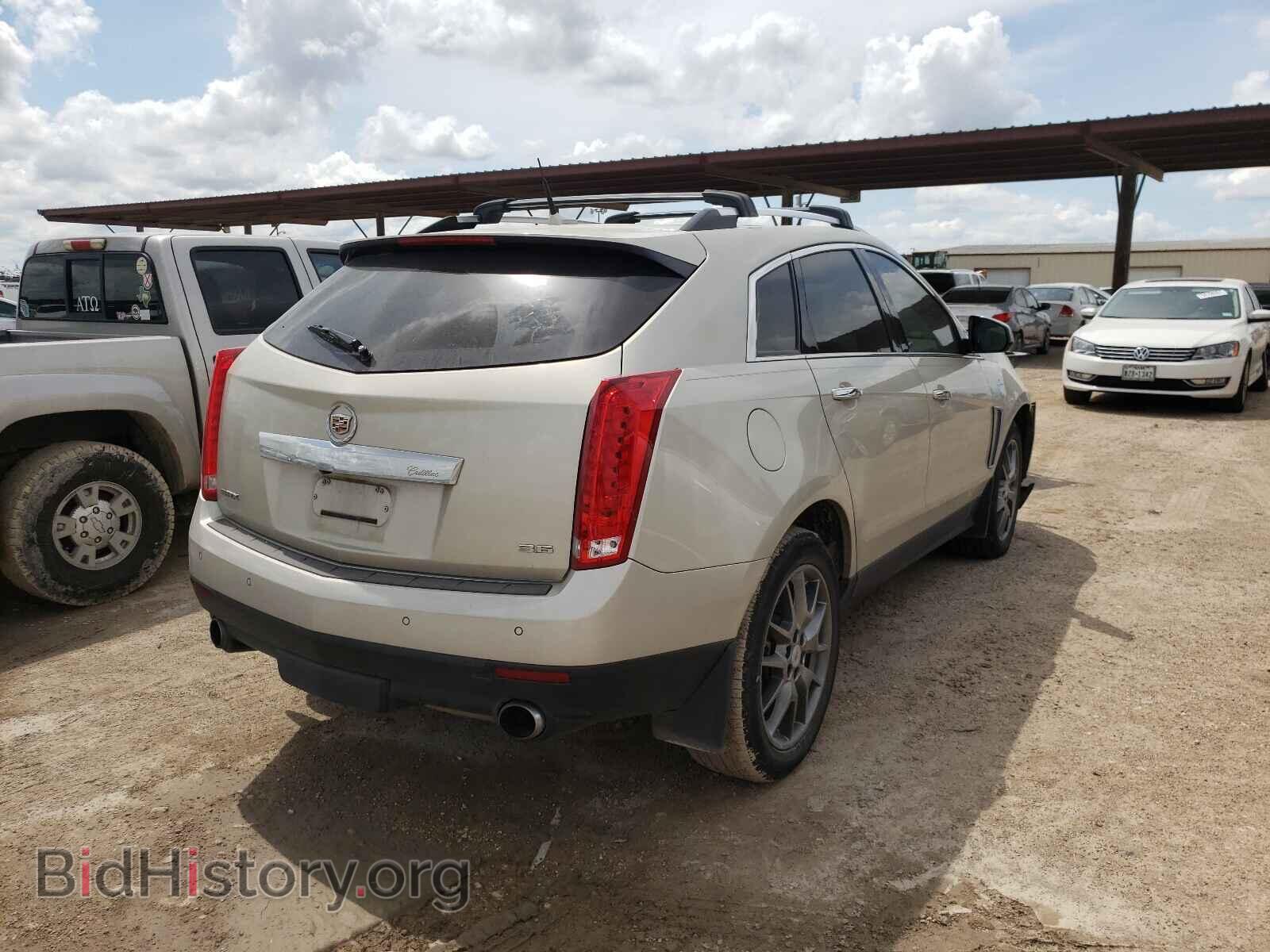2014 CADILLAC SRX - VIN: 3GYFNDE38ES652168 - Фото 4