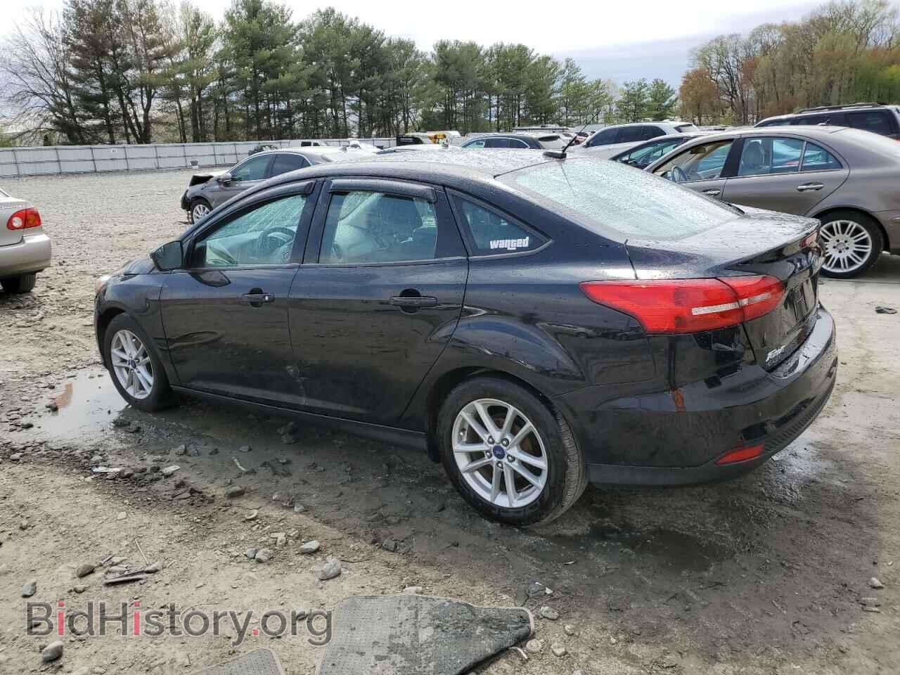 2016 FORD FOCUS - VIN: 1FADP3F21GL334852 - Фото 2
