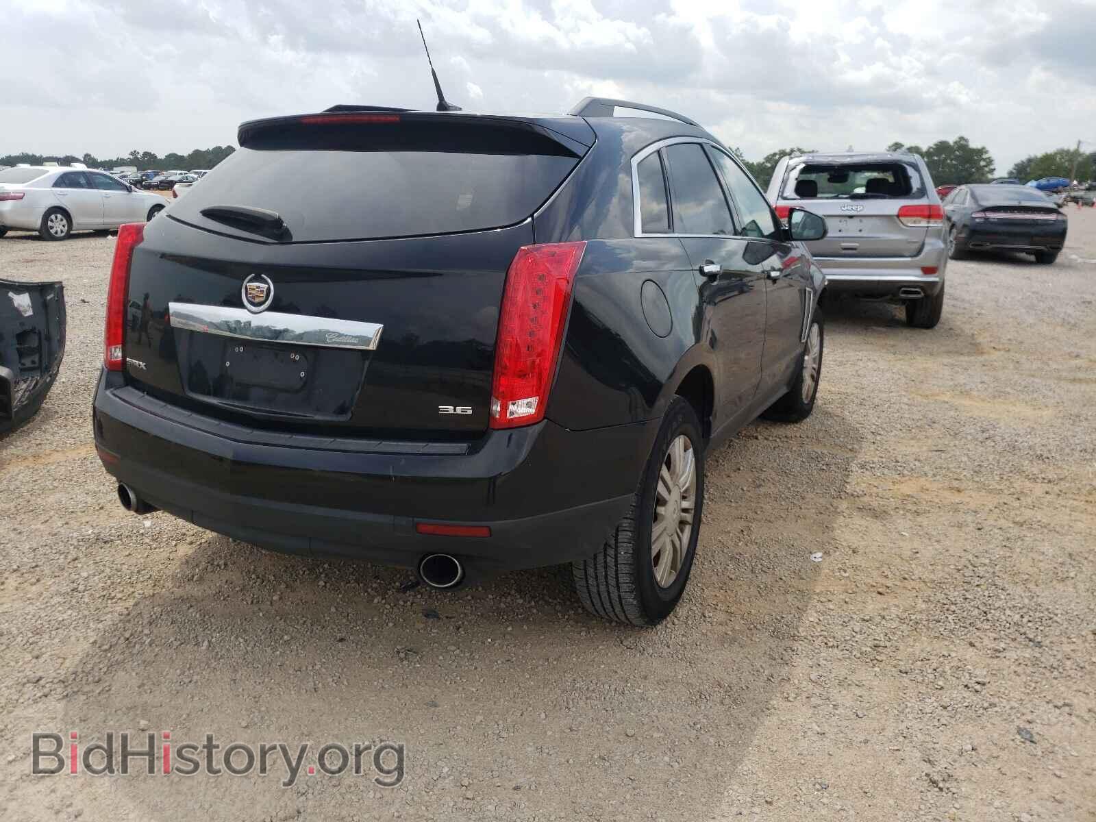 2014 CADILLAC SRX - VIN: 3GYFNAE3XES659251 - Фото 4