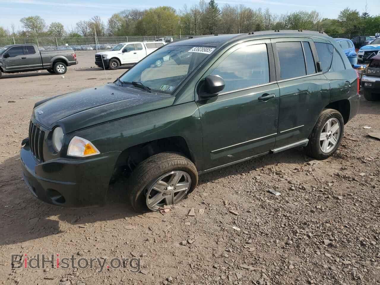 Photo 1J4NF4FB3AD593457 - JEEP COMPASS 2010