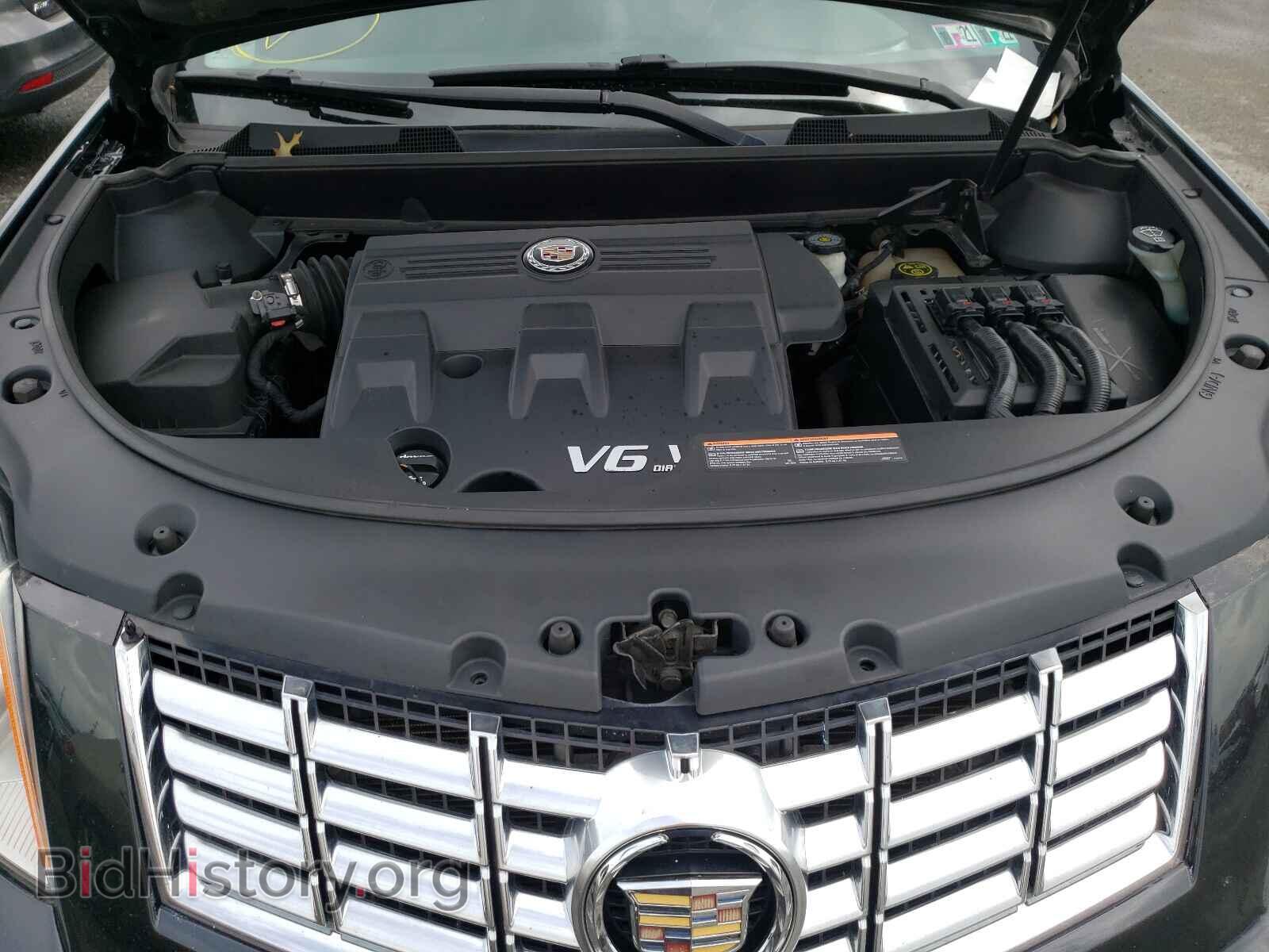 2013 CADILLAC SRX - VIN: 3GYFNCE34DS654444 - Фото 7