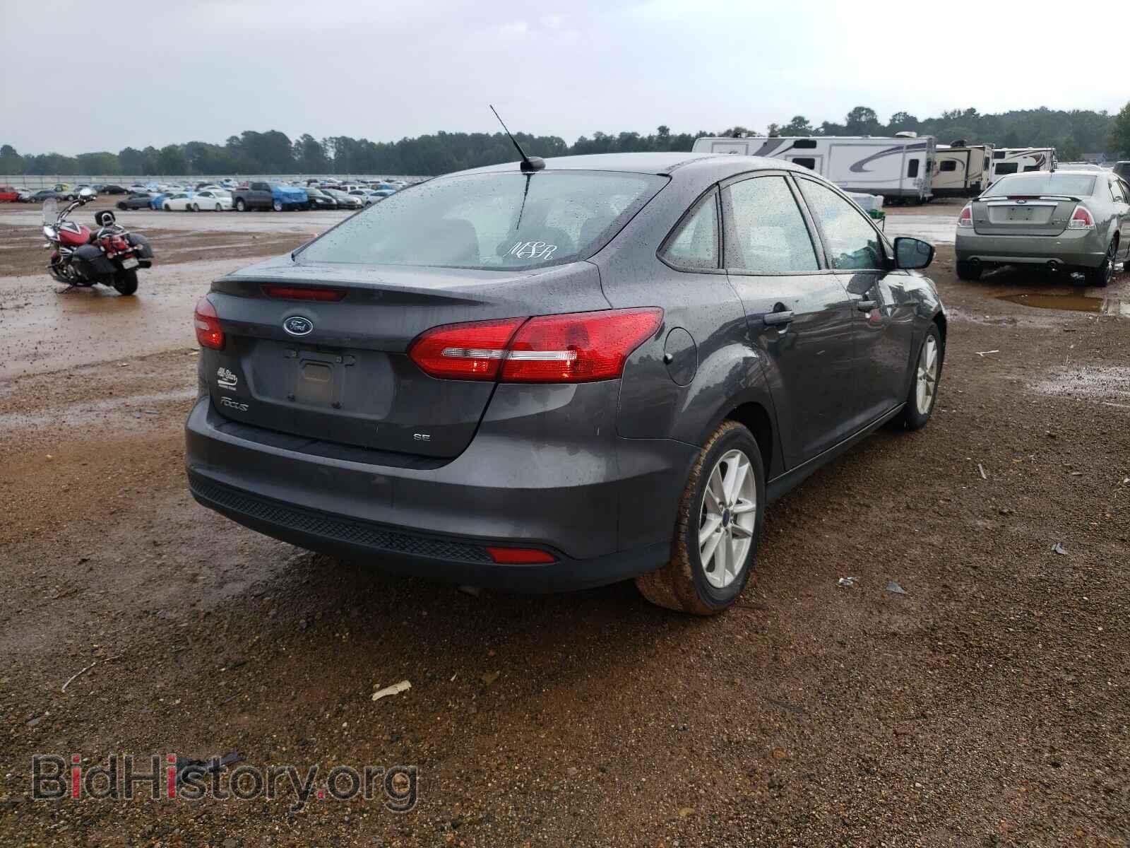 2017 FORD FOCUS - VIN: 1FADP3F25HL204946 - Photo 4
