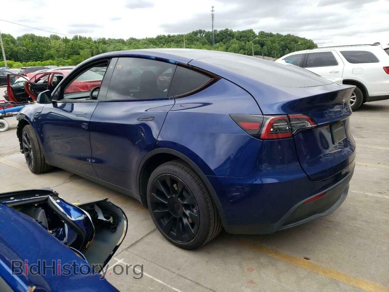 2023 TESLA MODEL Y - VIN: 7SAYGDEEXPF607211 - Фото 2