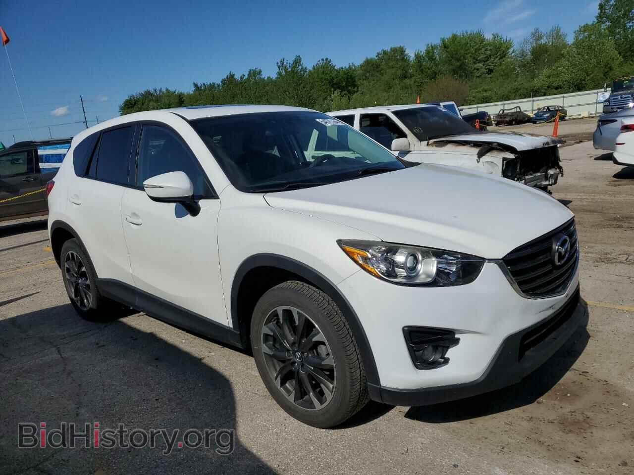 2016 MAZDA CX-5 - VIN: JM3KE4DY8G0611588 - Фото 4