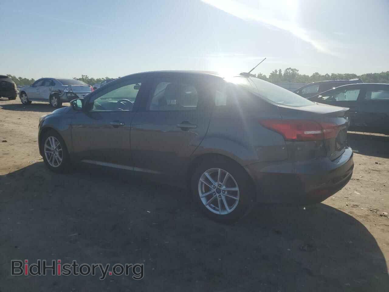 2016 FORD FOCUS - VIN: 1FADP3F21GL242592 - Фото 2