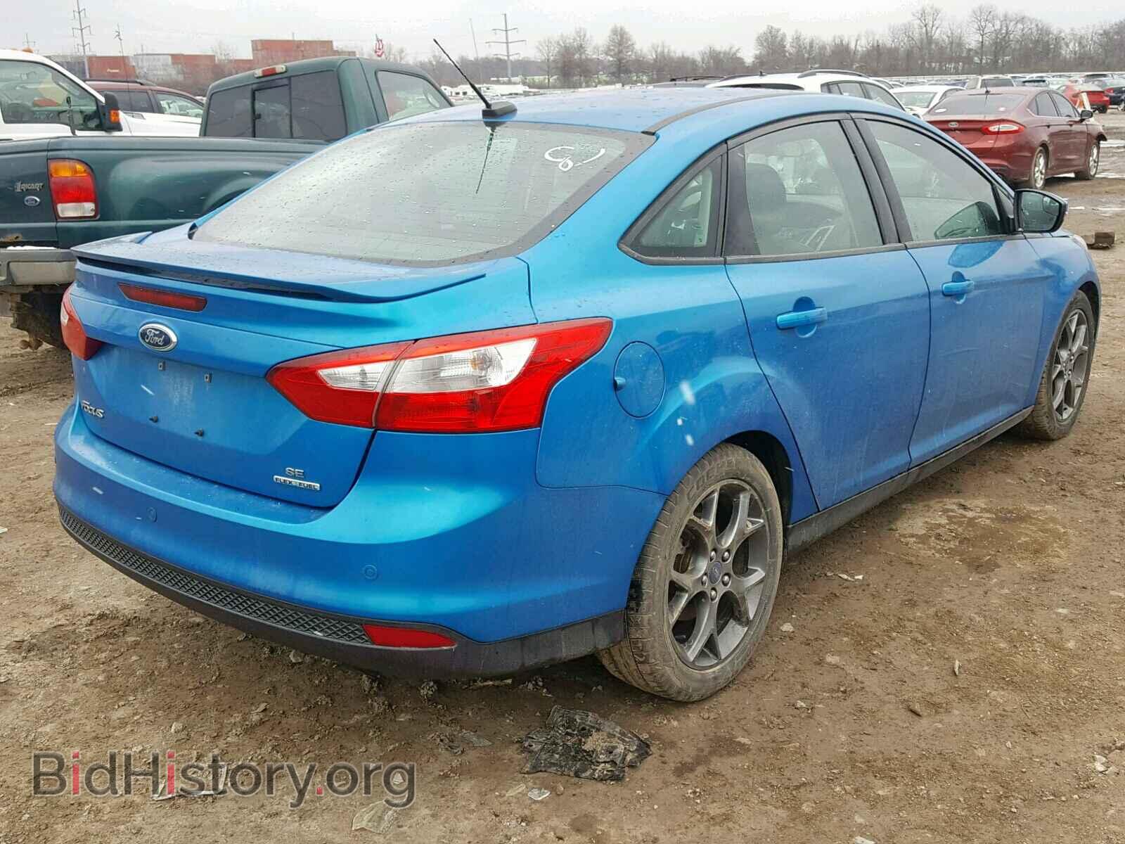 2014 FORD FOCUS - VIN: 1FADP3F21EL160908 - Photo 4