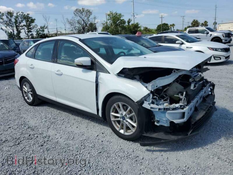 2015 Ford FOCUS (VIN 1FADP3F22FL259660) — photo 4 of 13