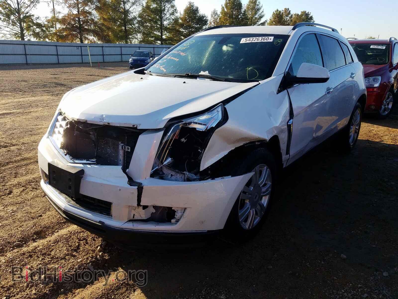 2014 CADILLAC SRX - VIN: 3GYFNAE30ES629319 - Фото 2