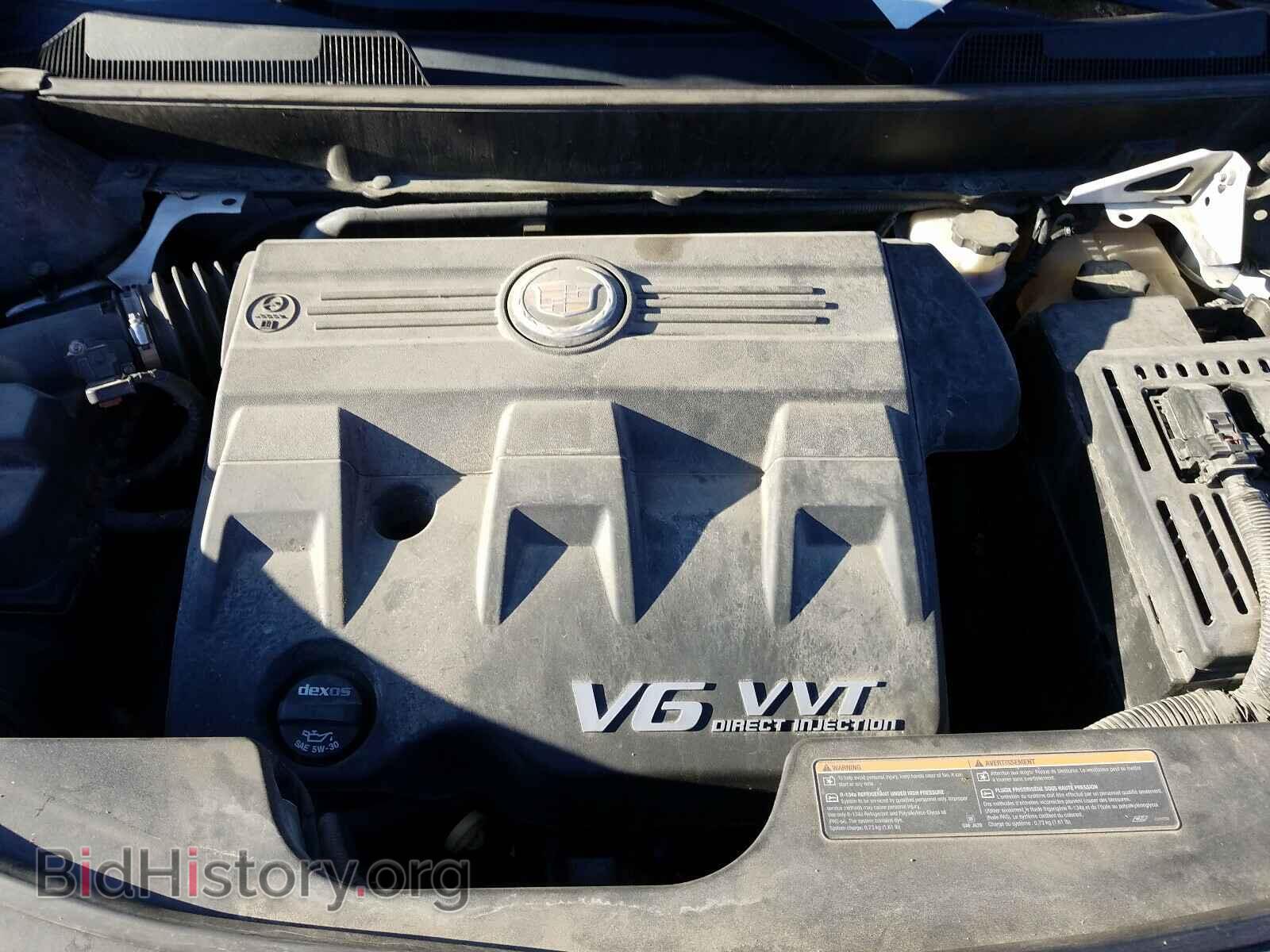 2014 CADILLAC SRX - VIN: 3GYFNAE30ES629319 - Фото 7