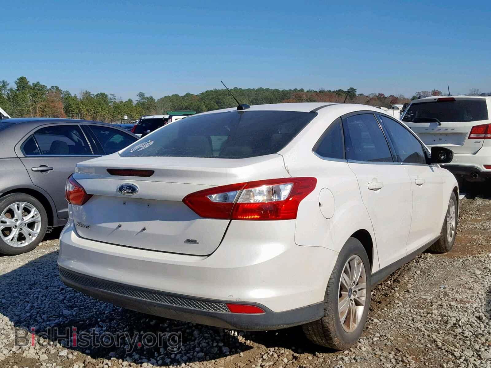 2012 FORD FOCUS - VIN: 1FAHP3H21CL168695 - Photo 4