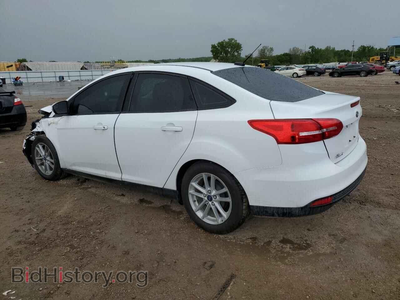 2016 FORD FOCUS - VIN: 1FADP3F21GL404723 - Фото 2