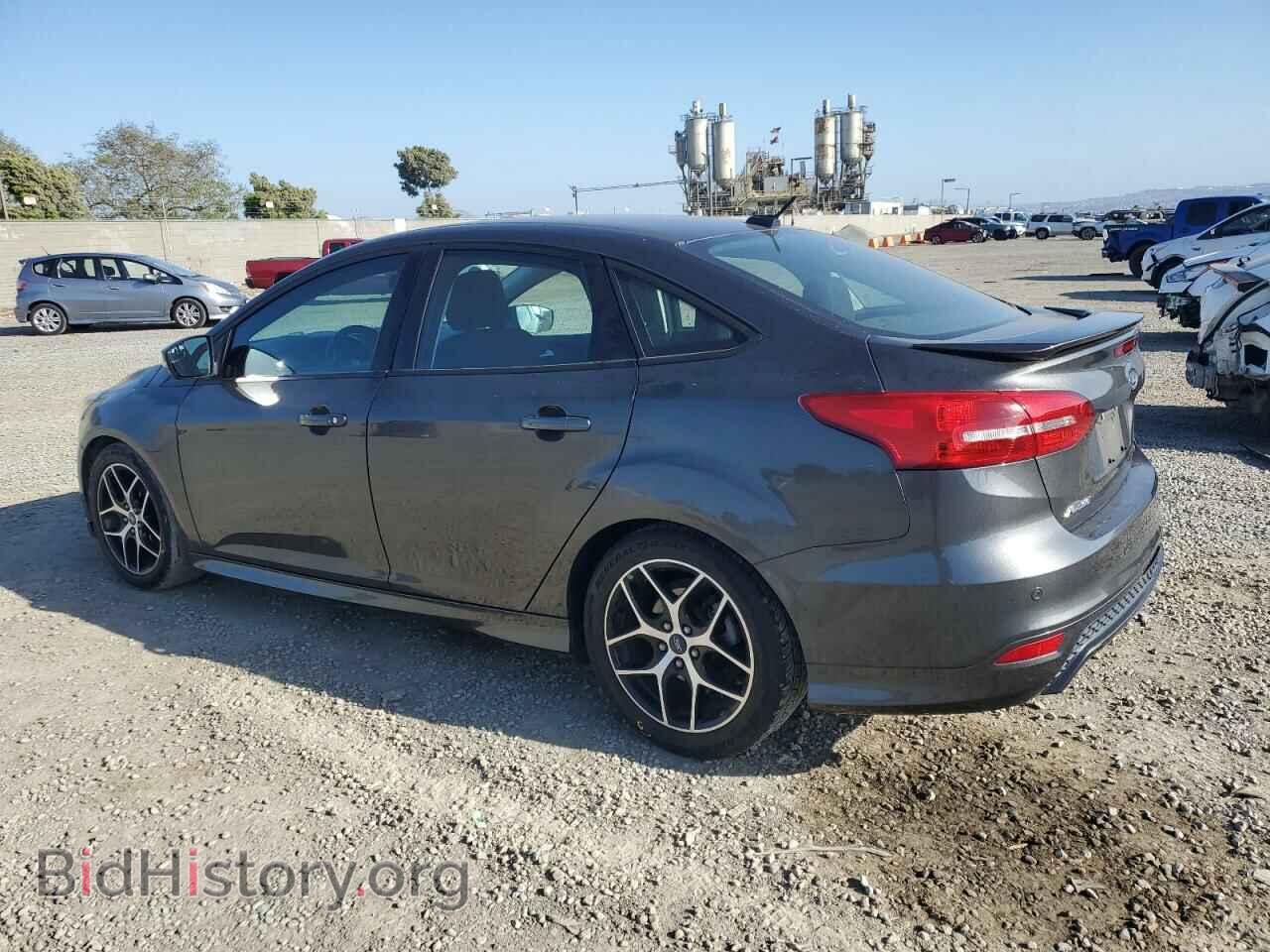 2016 FORD FOCUS - VIN: 1FADP3F24GL306270 - Фото 2